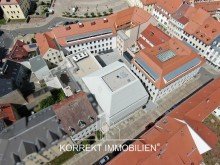 Blick von oben Attraktives Investment: Umnutzung eines Mehrfamilienhauses zu modernen Studentenapartments