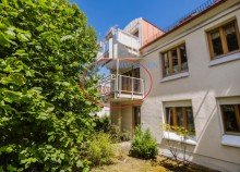 Balkonansicht Familienfreundliche Eigentumswohnung mit Balkon in gepflegtem Wohnquartier: 3 Zimmer | Westbalkon | TG-Stellplatz. Zum Eigennutz oder als Kapitalanlage!