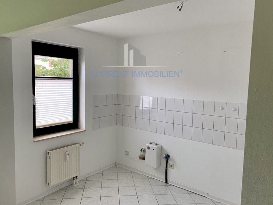 K�che mit Fliesenspiegel Etagenwohnung Dresden / Cotta